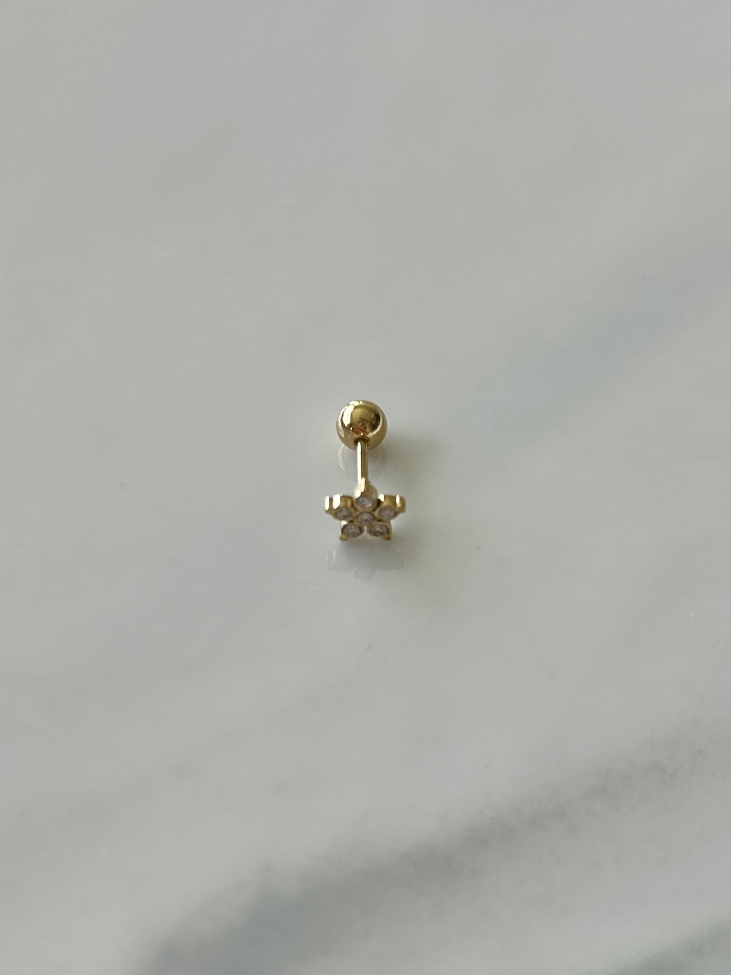 Piercing oreille fleur